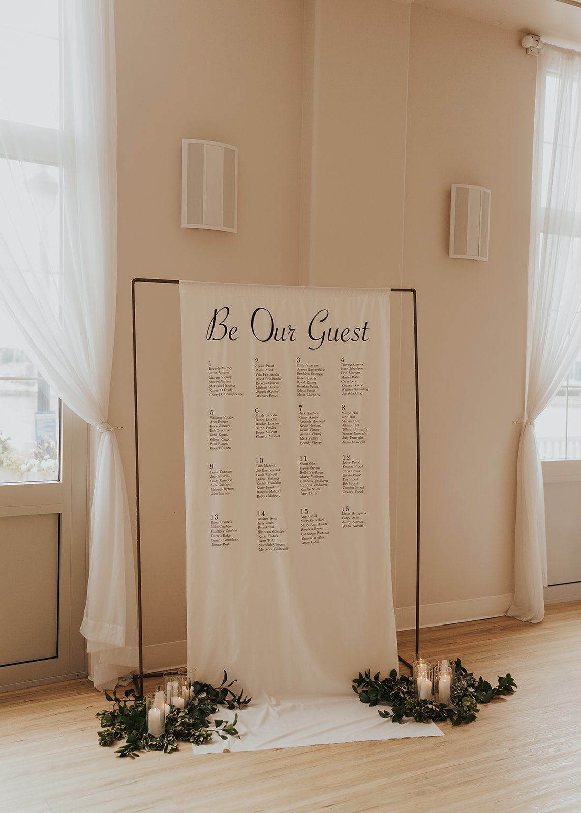 detail photo of seating chart at a wedding at the arbor at the port