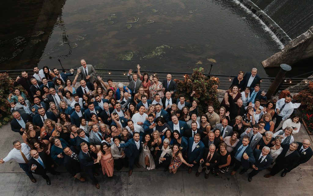 group photo of guests at nicole and anthony's wedding in rocehster ny