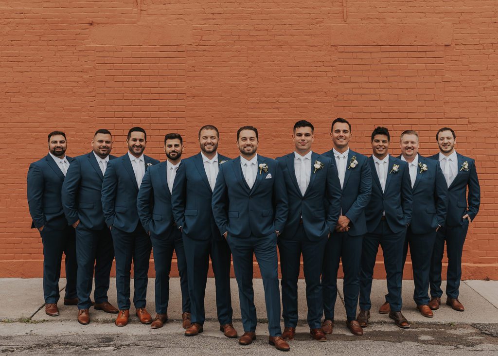 Groom with his groomsmen during the bridal party photos