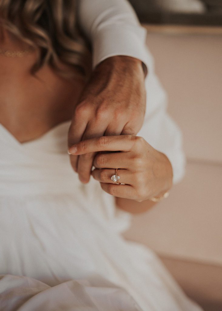 closeup of an engagement ring during a couples destination engagement session at the hermitage hotel