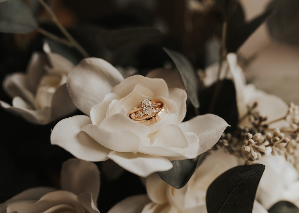 wedding rings in the brides bouquet